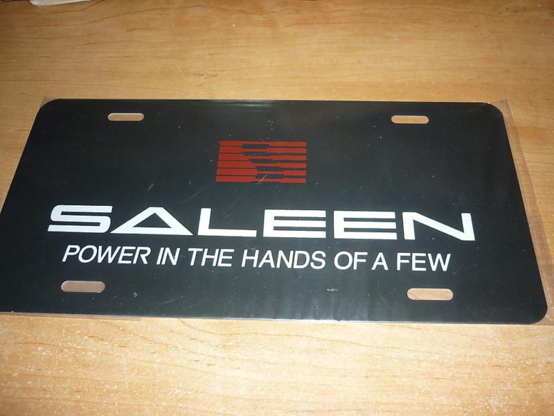 Ford mustang saleen s281 s351 h302 f-150 power in the hands of a license plate