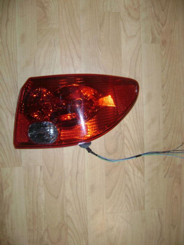 2003-04-05 saturn l200 / l300 sedan - oem right tail light