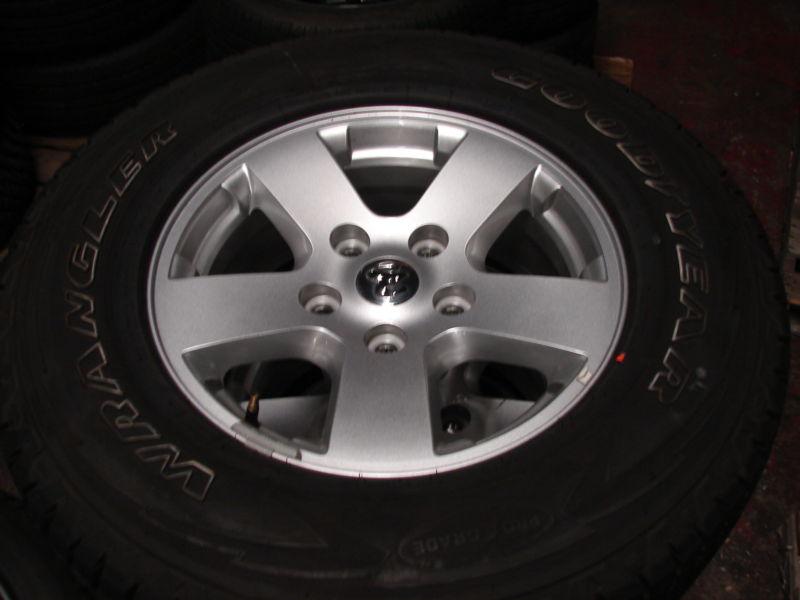 4- 17" dodge ram 1500 5 spoke wheels rims goodyear 10 ply tires 2366