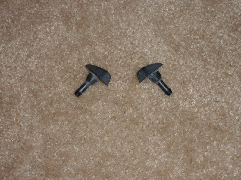 A pair of volvo s60 s70 v70 850 windshield washer hood spray pattern nozzles