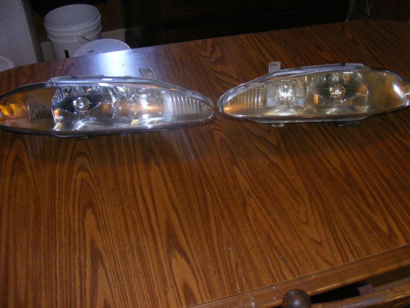 1995 mitsubishi eclispe headlight set