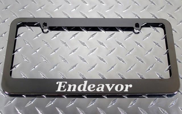 1 brand new mitsubishi endeavor gunmetal license plate frame + screw caps