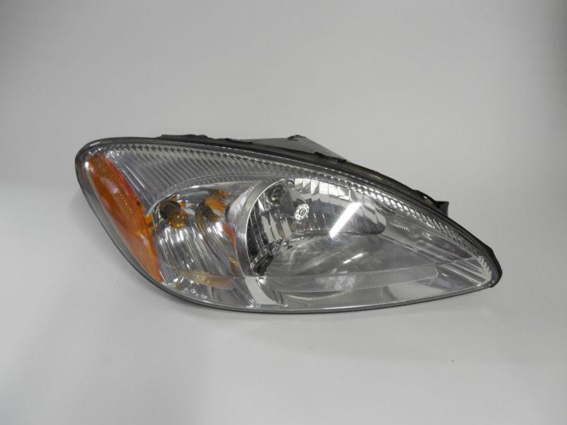 00 01 02 03 04 05 06 07 ford taurus oem right headlight nice!