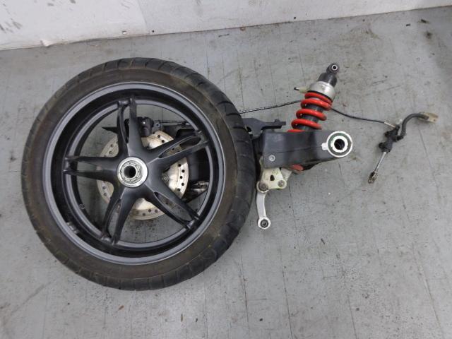 2005 triumph sprint 1050 rear end single sided swingarm wheel caliper shock nice