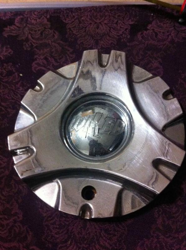 1 wired wheels chrome center cap   part# n26  stock# 297-298