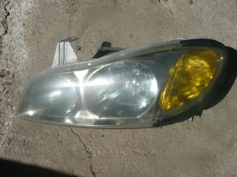 00  01  infinity i30   i30  drivers side headlight with hid module oem