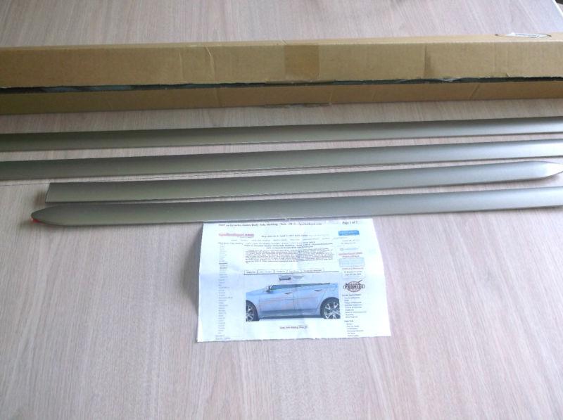 4 brand new top quality side moldings for 4 door car - beige or gold  