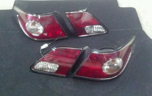 Lexus es300 es oem tail light oem 02 lh driver quarter trunk mounted