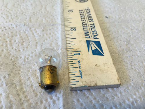 Ford; chrysler; gm; studebaker; old car light bulb,   pn 257.   item:  0023