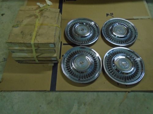 1980 -87 cadillac set of hubcaps, turbine style, nos