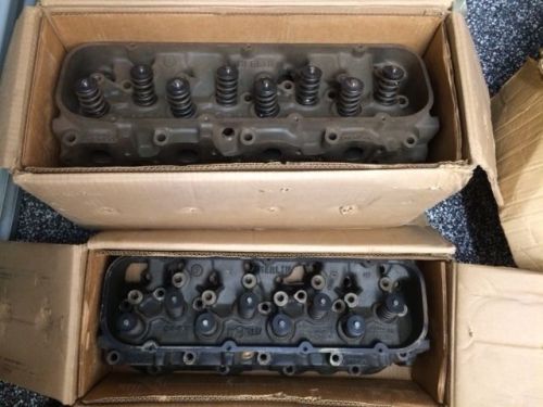 World products merlin jenkins cast big block heads w/springs stamped 044 in box