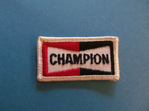 Champion sparkplugs nhra nascar f-1 sponsor hat jacket racing gear patch