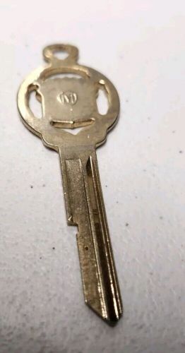 Vintage cadillac gold plated crest &#039;m&#039; key blank