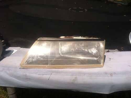 Original 95-97 oem lincoln continental driver side  headlight headlamp