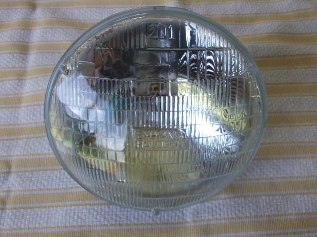 Harley davidson 7 inch oem halogen sealed beam headlight part number 67713-86 