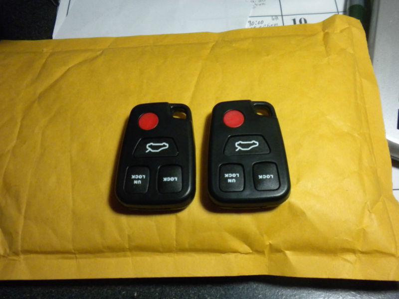 Two 4 botton volvo v70 key fobs