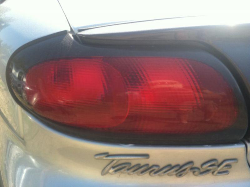 1996 1997 ford taurus both tail lights  driver and passenger fast shipping