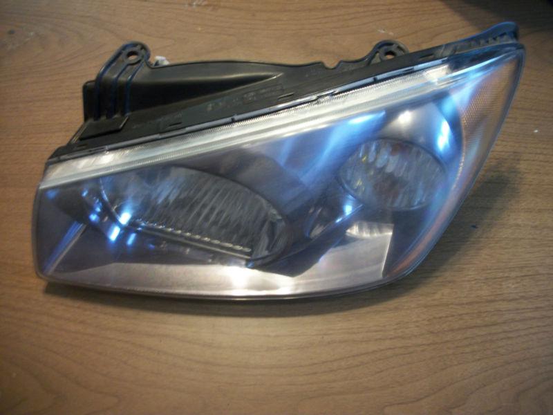 2005 kia spectra left headlight black bezel oem