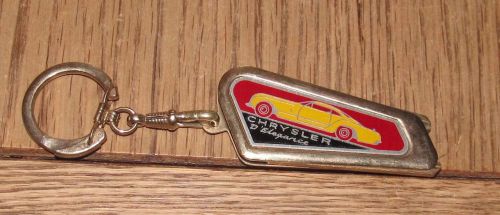 Vintage 1949-1955 chrysler d&#039;elegance foldout key blanks keyholder keychain.