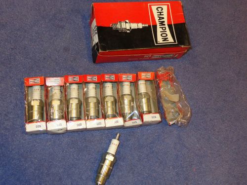 Nos champion d23 spark plugs......farm equipment.....champion stock #523