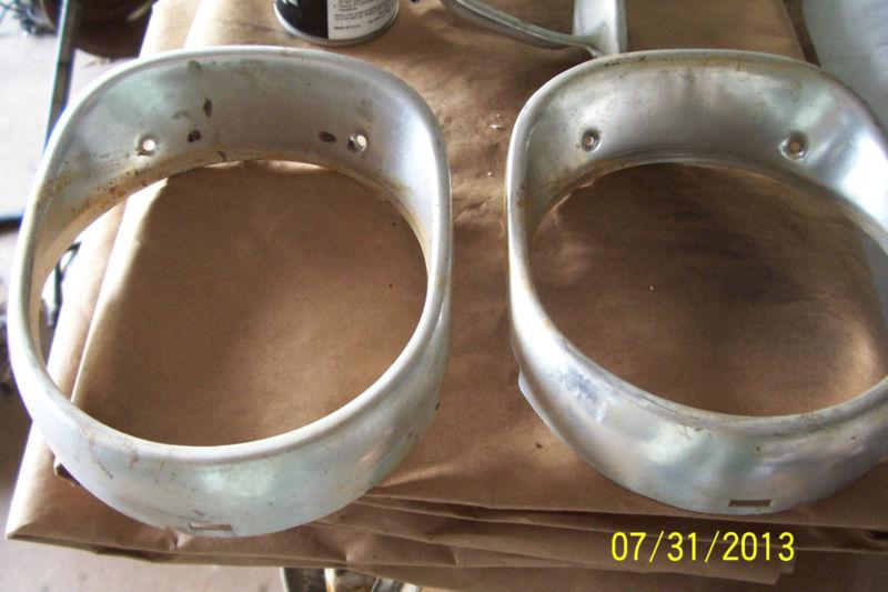 1965 chevy impala headlight bezels, great shape, needs polishing ss