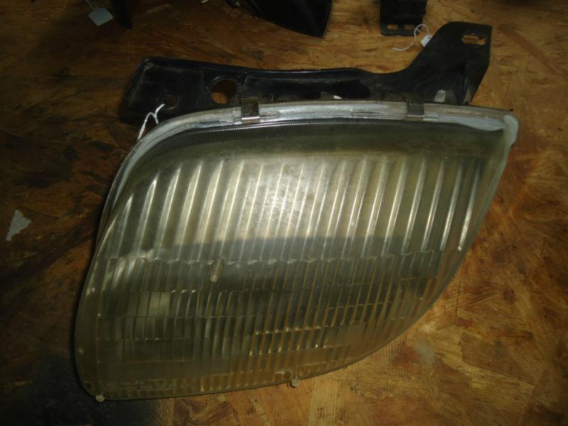 Driver left side headlight assembly pontiac sunfire & more models 2000-05 09011