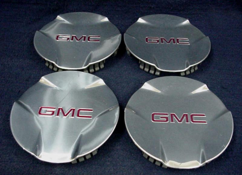 Gmc envoy denali 06-09 polished center caps - set 4 fits the 18" 9 spoke wheel 