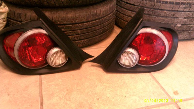 Dodge neon 2000-05 aftermarket tail lights set of two