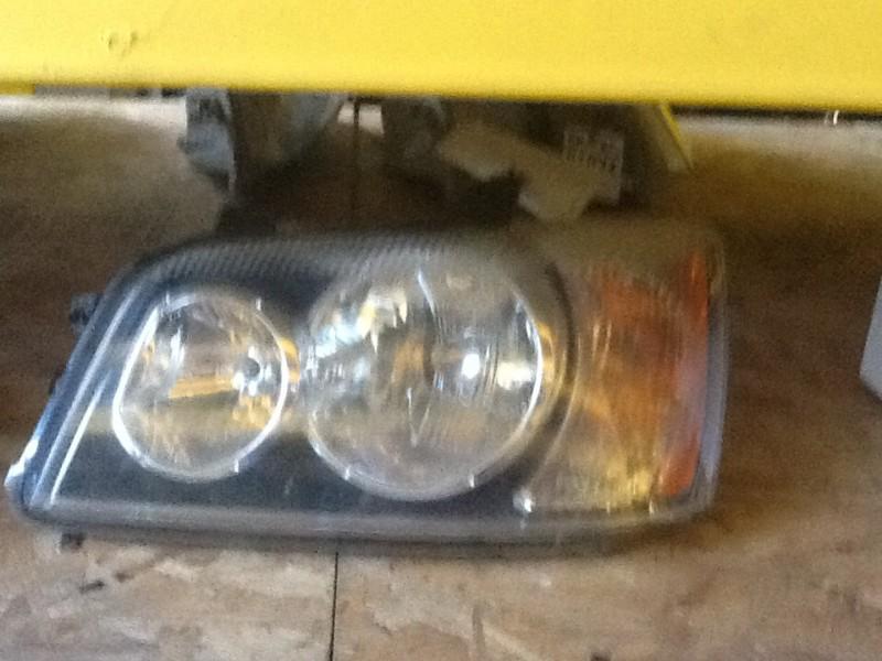 Toyota highlander headlight oem 00 01 02 03