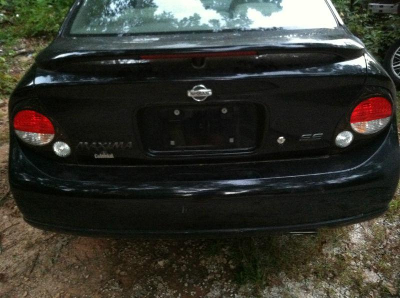 00 01 02 03 nissan maxima rear bumper cover black color