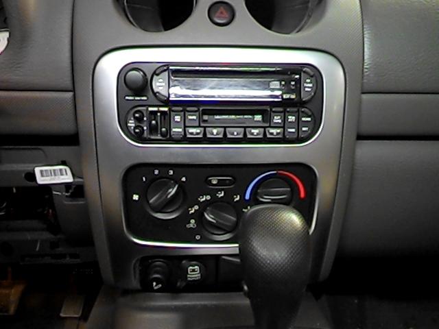 2002 jeep liberty radio trim dash bezel 2641720