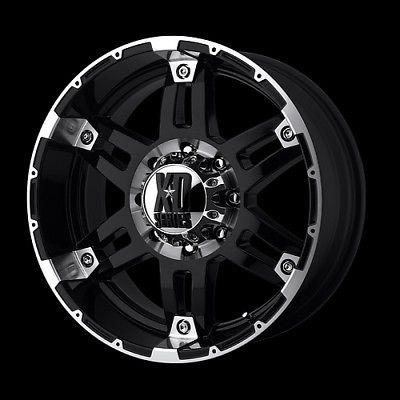 18" xd spy gloss black with 325-65-18 nitto terra grappler tires at wheels rims