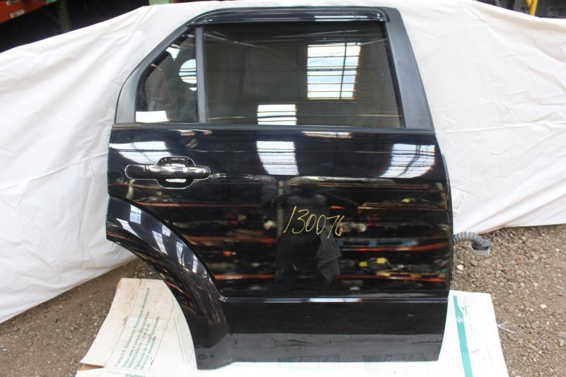 08 09 taurus x r. rear side door elec tinted