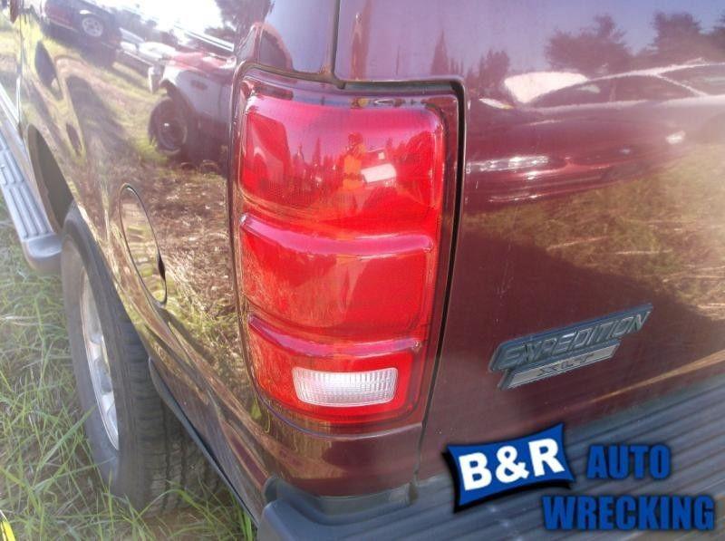 Left taillight for 97 ford expedition ~ non-metalic coated body 4934586