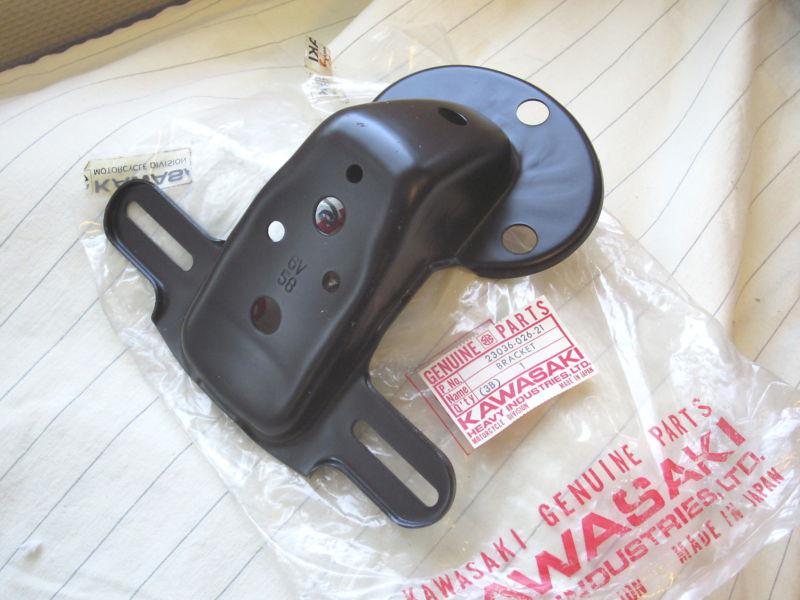 Kawasaki 125  f6b tail lamp bracket license plate 23036-026-21 nos