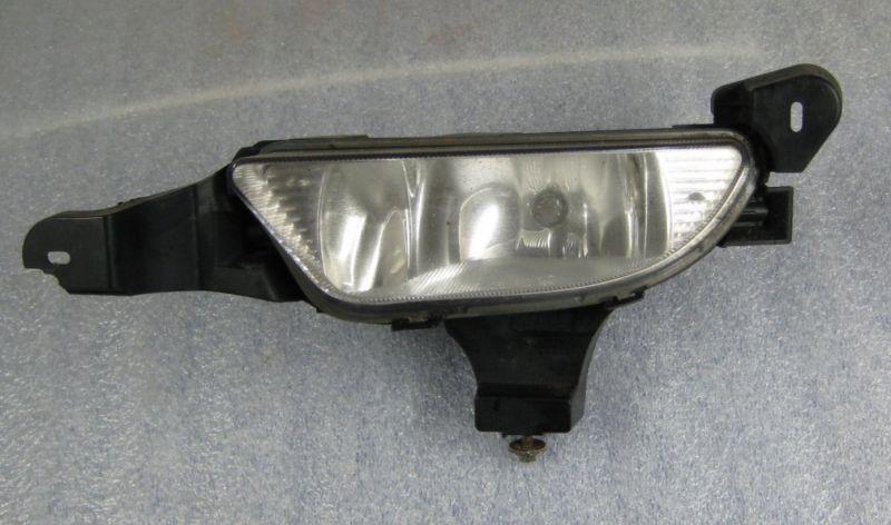 Ford 500 left fog light drivers side 05-07 oem five hundred