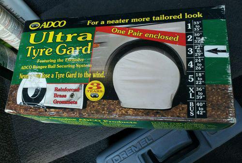 Tire guard , 27_29 inch ,a pair, "new" in the box ultra tyre gard , polar white 