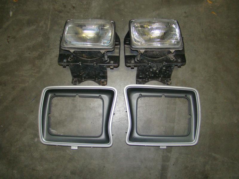 73-79 ford truck 78-79 bronco retangular headlight buckets and bezel door trim