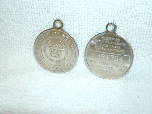 Cadillac &#034; silver  &#034; key chain disc&#034;- 1990&#039;s  gold key delivery-original -used