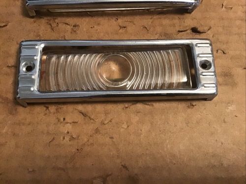 1947-52 chevy tr. parking light bezels and glass lenses oem pair