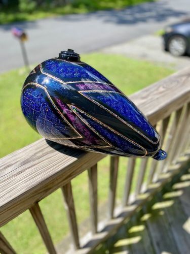 Custom painted axed chopper gas tank