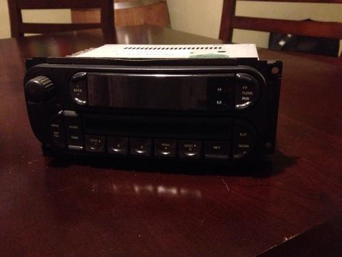 02-07 dodge chrysler jeep radio cd player factory oem  p05091506ae *