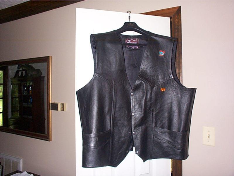 Real mans leather motorcycle vest with harley davidson st. thomas pin, size 62