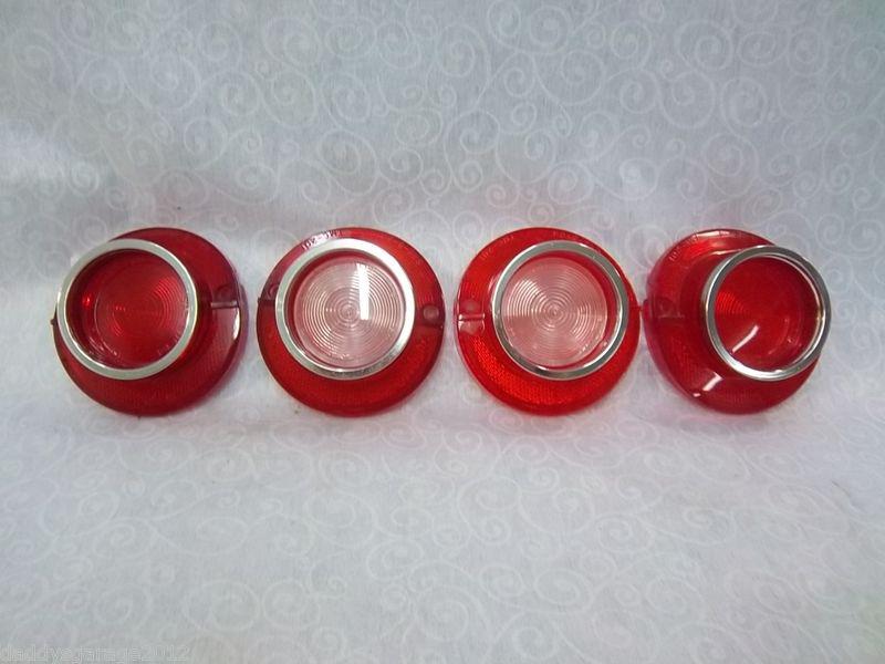 65 chevy bel air, set of 4 tail light lens with back ups. nors. excludes wagons