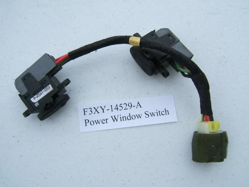 New - oem ford f3xy-14529-a power window switch (rear)