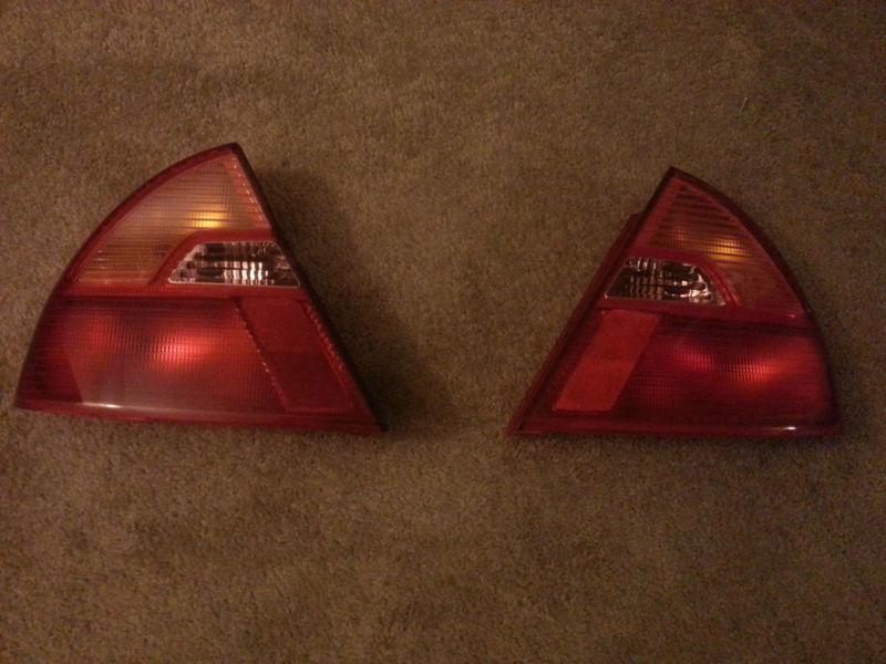 1999-2002 mitsubishi mirage tail lights oem