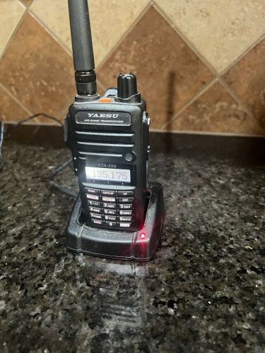 Yaesu fta-250l handheld nav/com transceiver with charging base. like new.