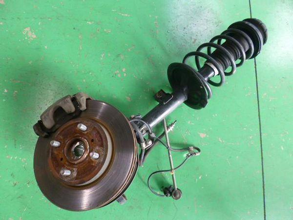 Suzuki swift 2006 front left strut assy [1350200]