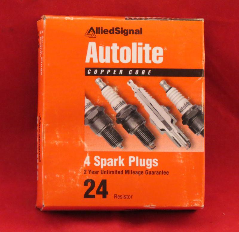 Four (4) new autolite 24 spark plugs in original box