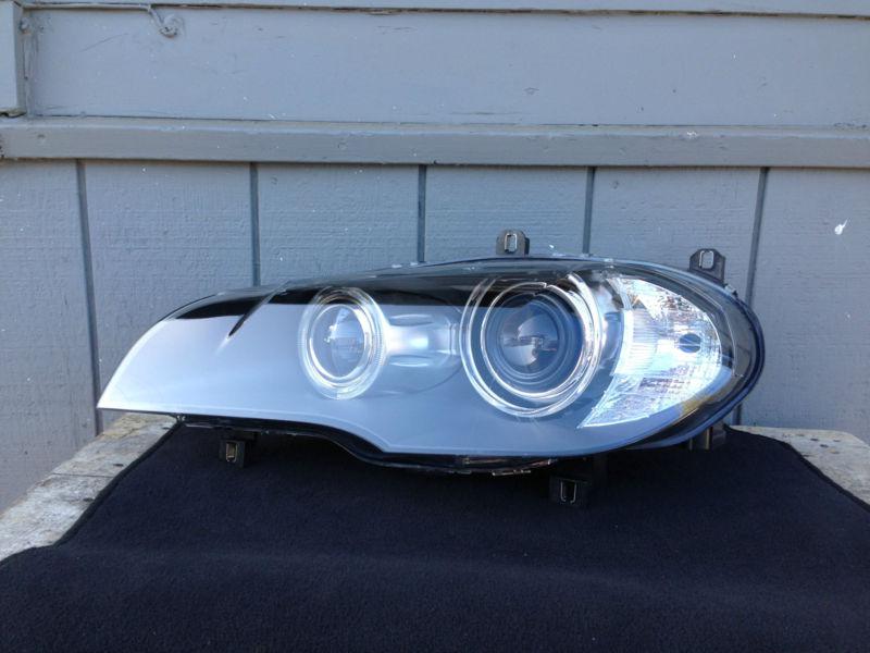 Bmw e70 x5 new in box xenon adaptive dynamic headlight driver left oem light